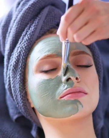 beautiful-woman-having-mask-lying-spa