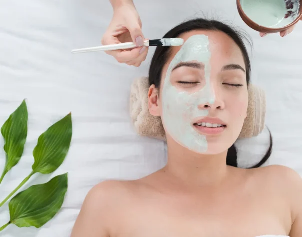 woman-with-facial-mask-spa